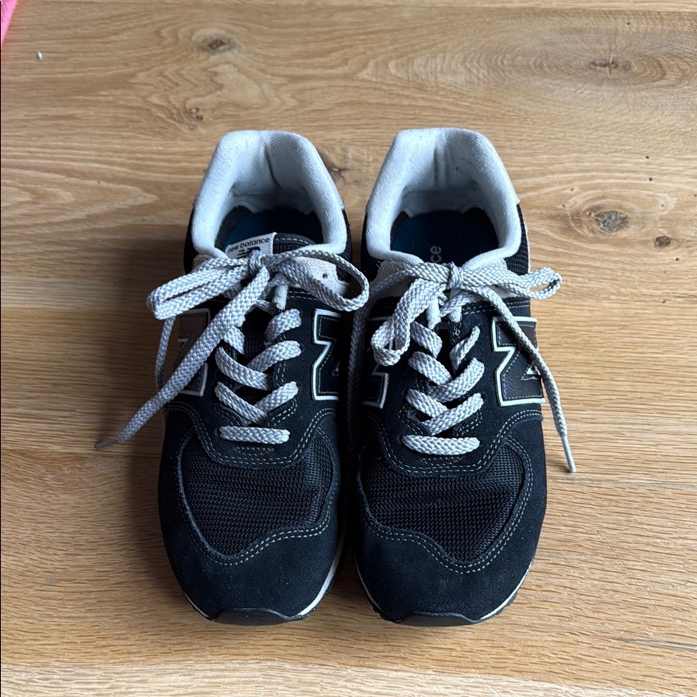 New Balance 574 Black and White Sneakers